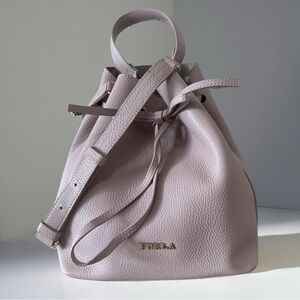 Furla Costanza small pebbled light pink leather drawstring bow bucket bag